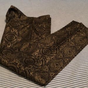 Dressy slacks in black and gold design